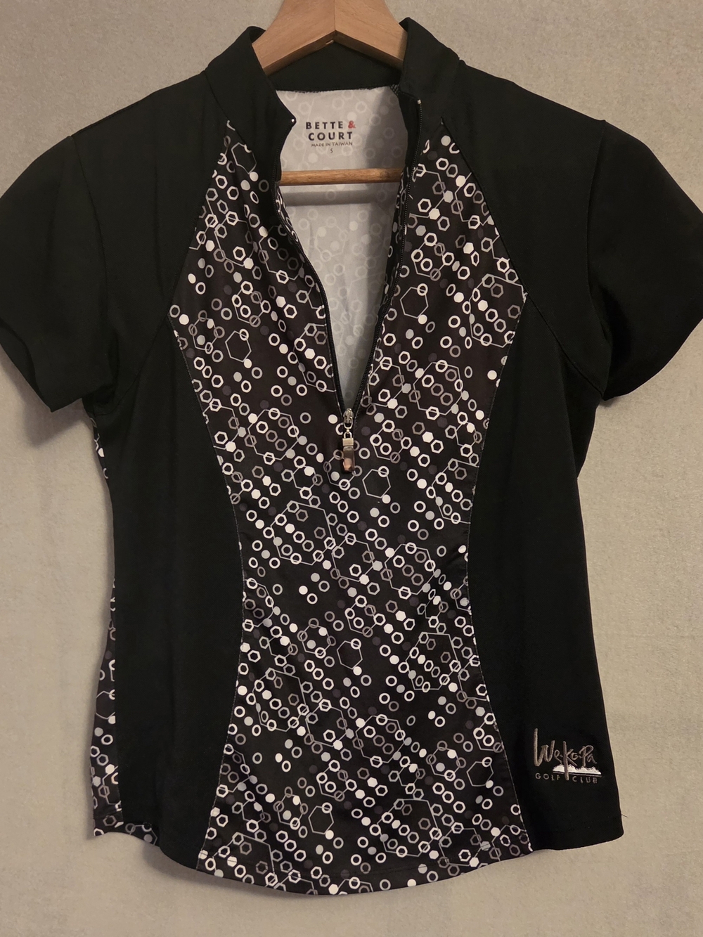 Bette & Court Women's Black Short-Sleeve Golf Polo with White Geometric Print. S